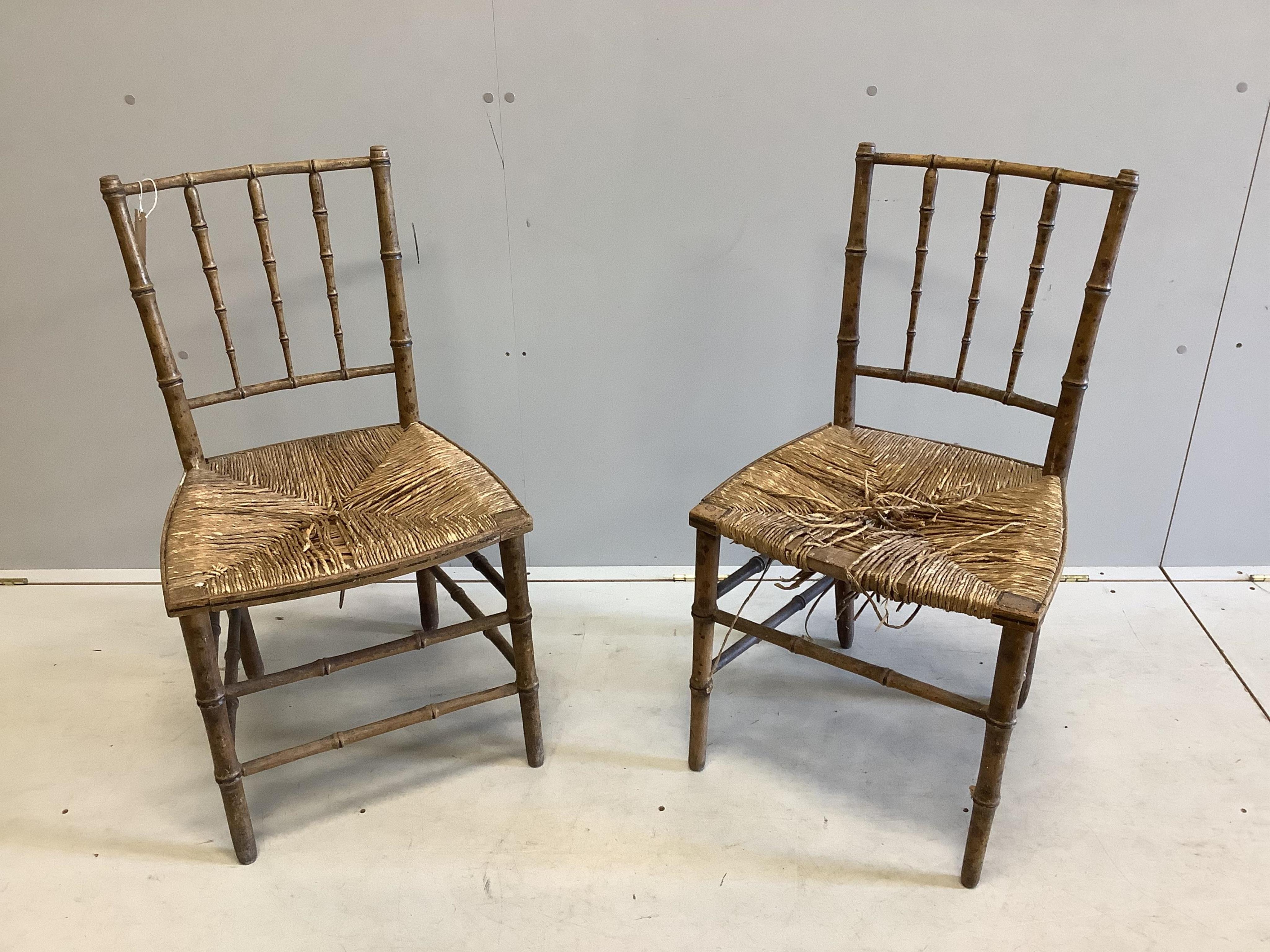 A pair of 19th century faux bamboo rush seat chairs, width 47cm, depth 40cm, height 87cm. Condition - poor